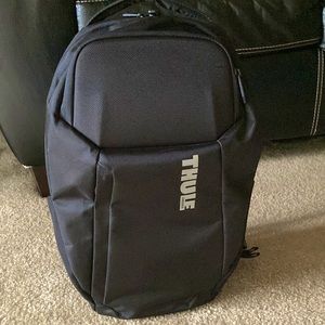 Electronic Thule backpack one size.